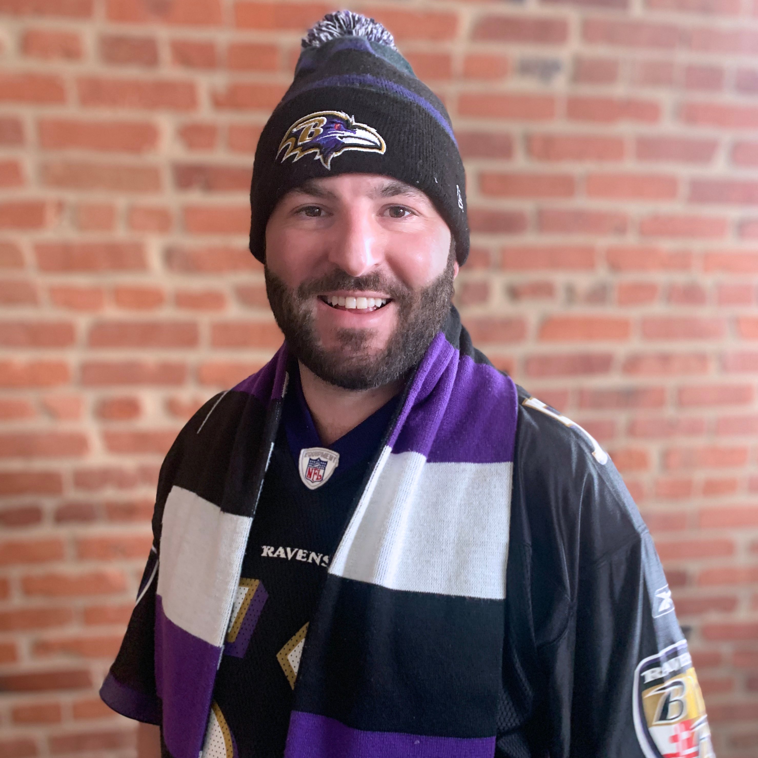 Alex Beigel Content Designer wearing Baltimore Ravens apparel